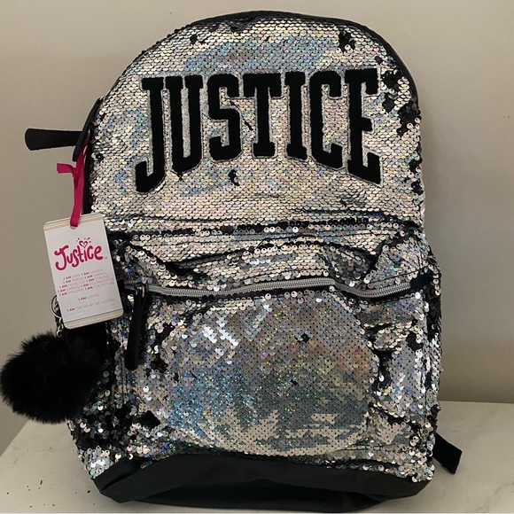 Justice Glitter Color Changing Backpack.
NWT - Picture 1 of 5